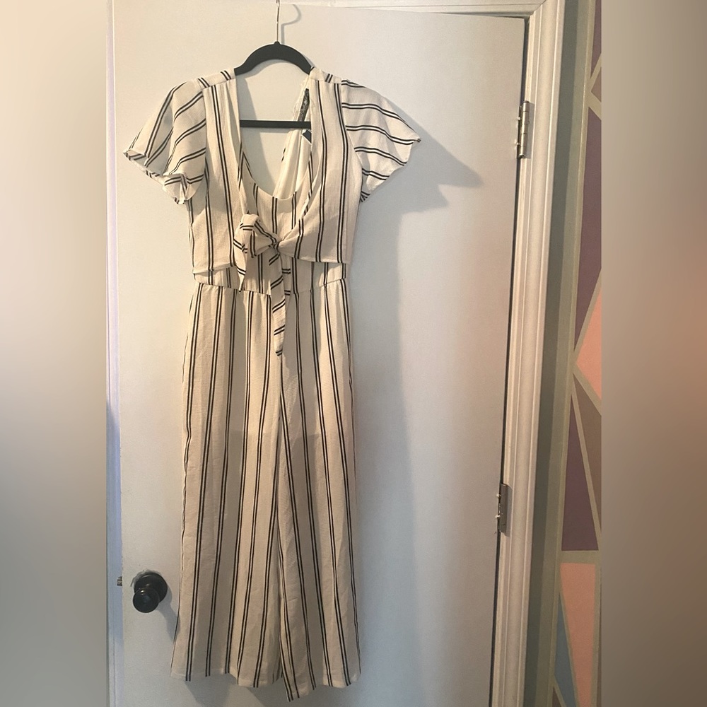 Woman’s romper white pin stripped size Small NEW with tags
